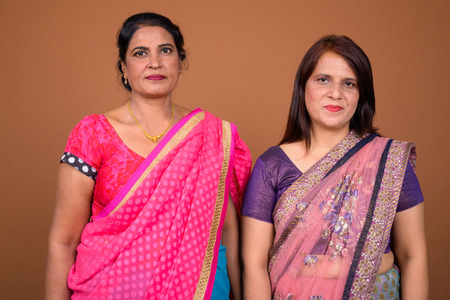 Two mature Indian women wearing Sari Indian traditional clothesの写真素材