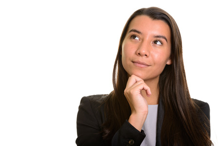 Young beautiful Caucasian businesswoman thinking and planningの写真素材