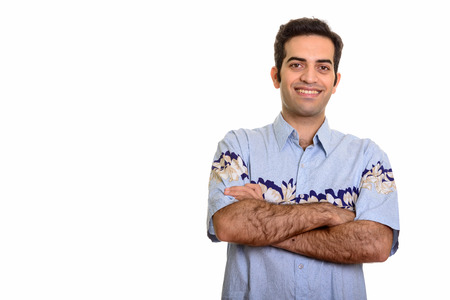 Young happy Persian man ready for vacationの写真素材