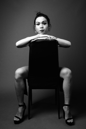 Young beautiful Asian transgender woman in black and whiteの写真素材