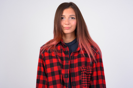 Young beautiful hipster woman against white backgroundの写真素材