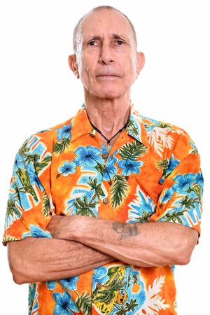 Studio shot of senior man with arms crossedの写真素材