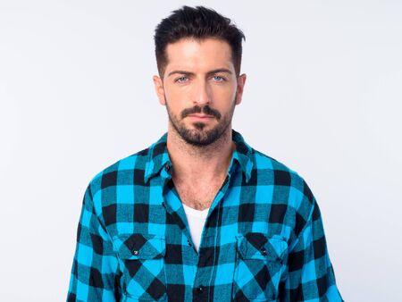 Face of young handsome bearded hipster manの写真素材