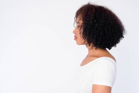 Closeup profile view of young beautiful African woman