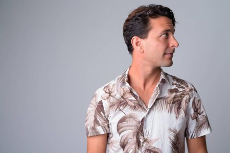 Closeup profile view of handsome Hispanic tourist manの写真素材