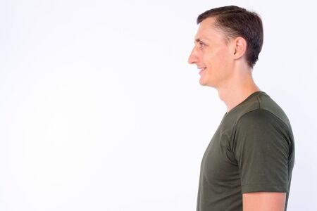 Closeup profile view of happy man smilingの写真素材