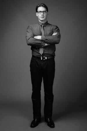 Studio shot of businessman shot in black and whiteの写真素材