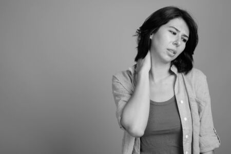 Portrait of young beautiful woman shot in black and whiteの写真素材
