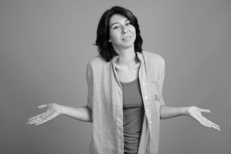 Portrait of young beautiful woman shot in black and whiteの写真素材