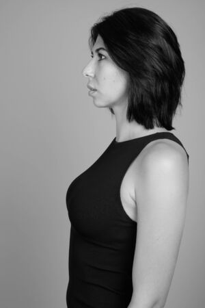 Portrait of young beautiful woman shot in black and whiteの写真素材