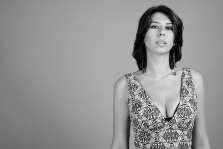 Portrait of young beautiful woman shot in black and whiteの写真素材