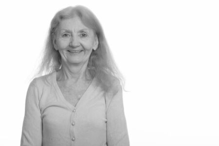 Studio shot of happy senior woman smilingの写真素材