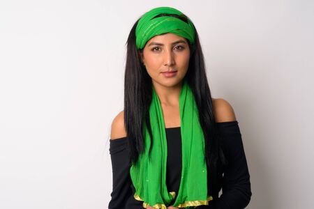 Portrait of young beautiful Persian woman with head scarfの写真素材