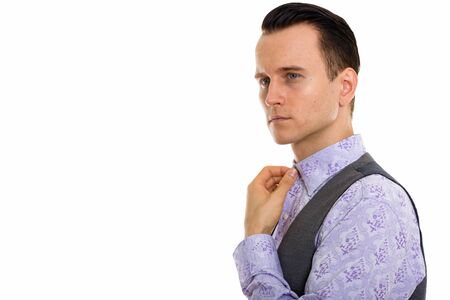 Portrait of young handsome businessman in formal clothingの写真素材