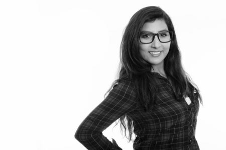 Close up of young happy Persian woman smiling with eyeglassesの写真素材