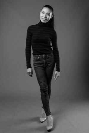 Young beautiful Asian transgender woman in black and whiteの写真素材