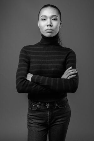 Young beautiful Asian transgender woman in black and whiteの写真素材