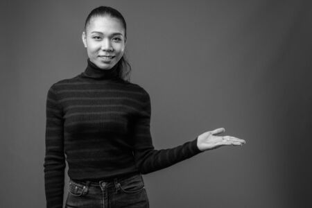Young beautiful Asian transgender woman in black and whiteの写真素材