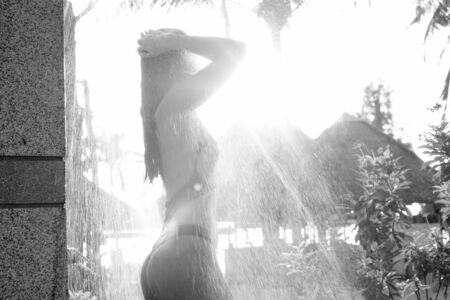 Young beautiful Asian tourist woman enjoying vacationの写真素材