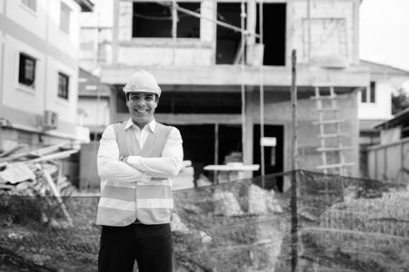 Handsome Persian man construction worker at the construction siteの写真素材