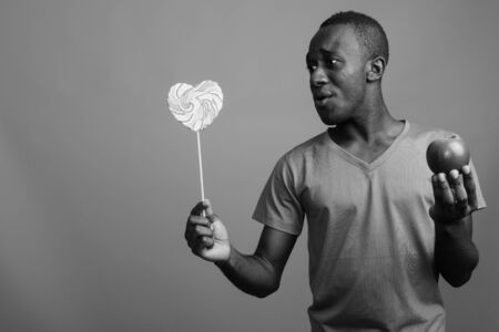 Portrait of young African man in black and whiteの写真素材