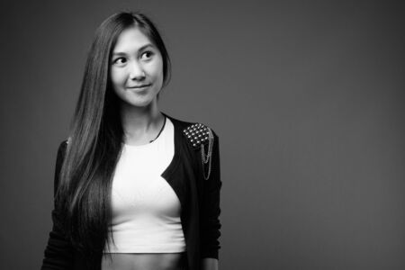 Young beautiful Asian woman in black and whiteの写真素材