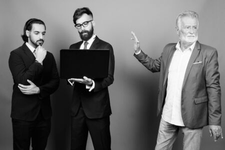 Portrait of multi ethnic bearded businessmen togetherの写真素材