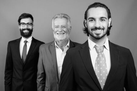 Portrait of multi ethnic bearded businessmen togetherの写真素材