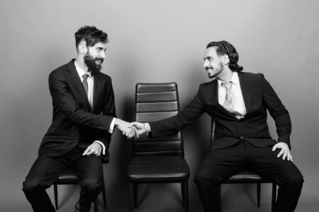 Portrait of multi ethnic bearded businessmen togetherの写真素材
