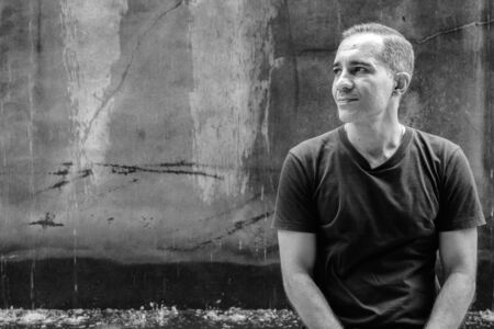 Portrait of mature Persian man outdoors in black and whiteの写真素材