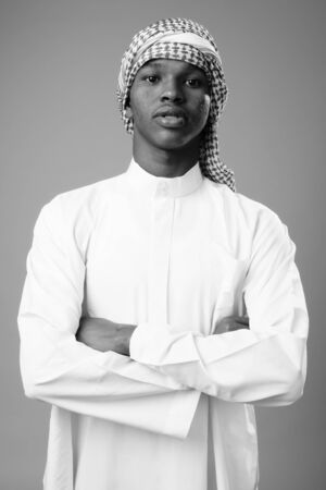 Young African man wearing traditional Muslim clothesの写真素材
