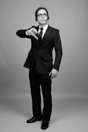 Portrait of handsome Persian businessman in suitの写真素材