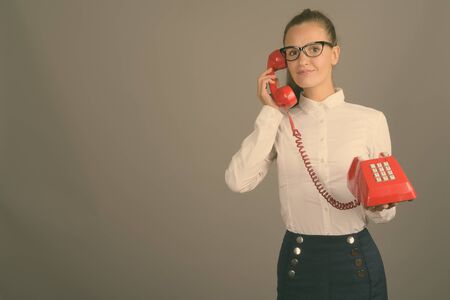 Portrait of young beautiful businesswoman with hair tiedの写真素材