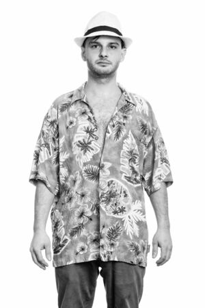 Studio shot of young tourist man ready for vacationの写真素材