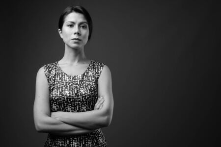 Portrait of beautiful multi ethnic businesswoman with short hairの写真素材