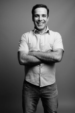 Portrait of handsome Persian man in black and whiteの写真素材