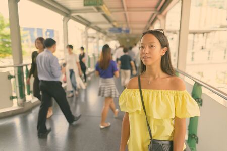 Young beautiful tourist woman exploring the cityの写真素材