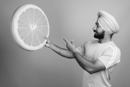 Young bearded Indian Sikh man wearing turbanの写真素材