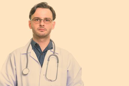 Face of young man doctor with eyeglassesの写真素材