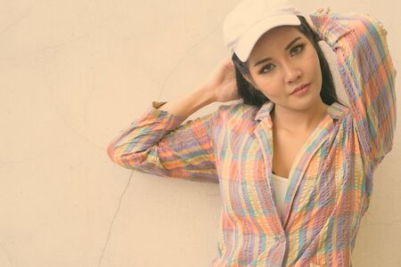 Young beautiful Asian tourist woman exploring the cityの写真素材