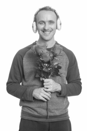 Portrait of happy handsome man ready for Valentines dayの写真素材