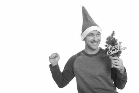 Portrait of happy handsome man ready for Christmasの写真素材