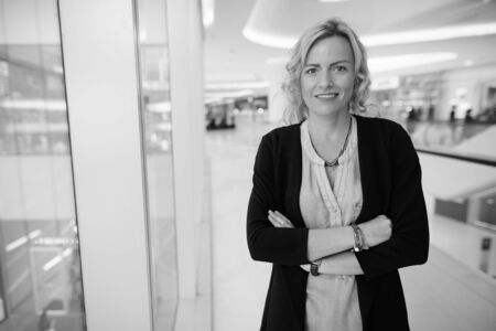 Beautiful blonde businesswoman exploring the city of Bangkok, Thailandの写真素材