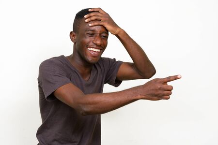 Portrait of happy young African man laughingの写真素材