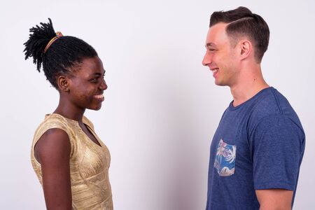 Portrait of young multi ethnic couple togetherの写真素材