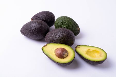 Portrait Of Delicious Avocados Against White Backgroundの写真素材