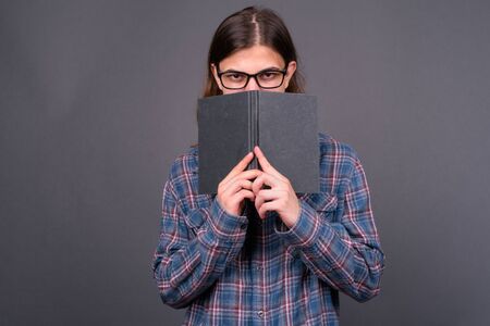 Young handsome hipster man with long hairの写真素材
