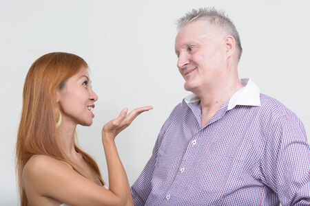 Happy mature multi ethnic couple together and in loveの写真素材