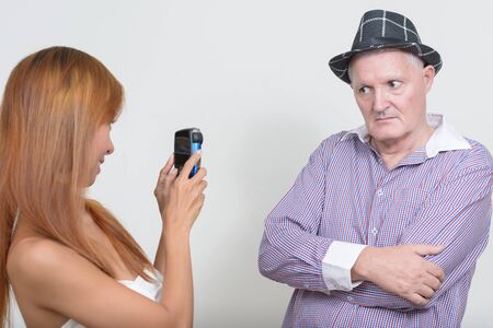 Happy mature multi ethnic couple together and in loveの写真素材