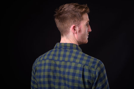 Closeup rear view of young handsome hipster man